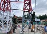 Wujudkan Impian Warga, Prajurit TNI Kebut Pembangunan Jembatan Gantung Sungai Ogan